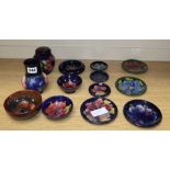 A collection of Moorcroft dishes and small vases