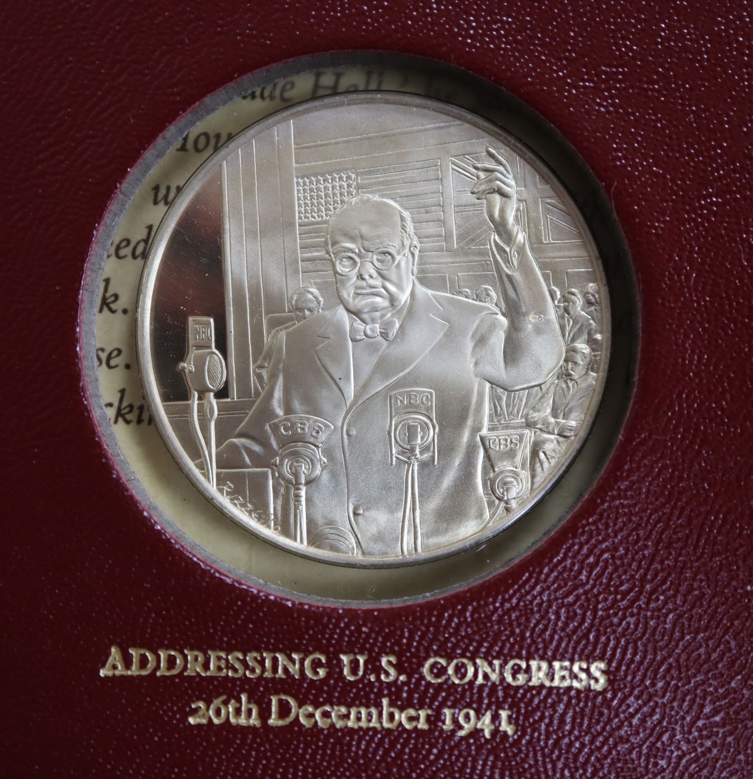 A John Pinches "The Churchill Centenary Medals Album" - twenty four silver medallions