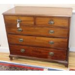 A George III mahogany chest fitted two short drawers and three graduated long drawers on ogee feet