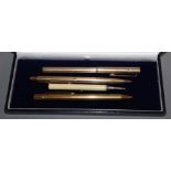 A gold plated Cartier rolled gold Dunhill and Parker Victorian ivory S Mordan and Co. pencil