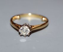 An 18ct gold and solitaire diamond ring, size H.