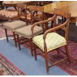 A set of six Regency mahogany dining chairs, two with arms