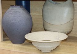 A black stoneware vase and two other items of Studio pottery, all with impressed marks