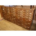 An early 20th century pine 35 drawer filing chest W.150cm