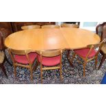 A mid century teak extending dining table and six chairs 206cm extended (one spare leaf)