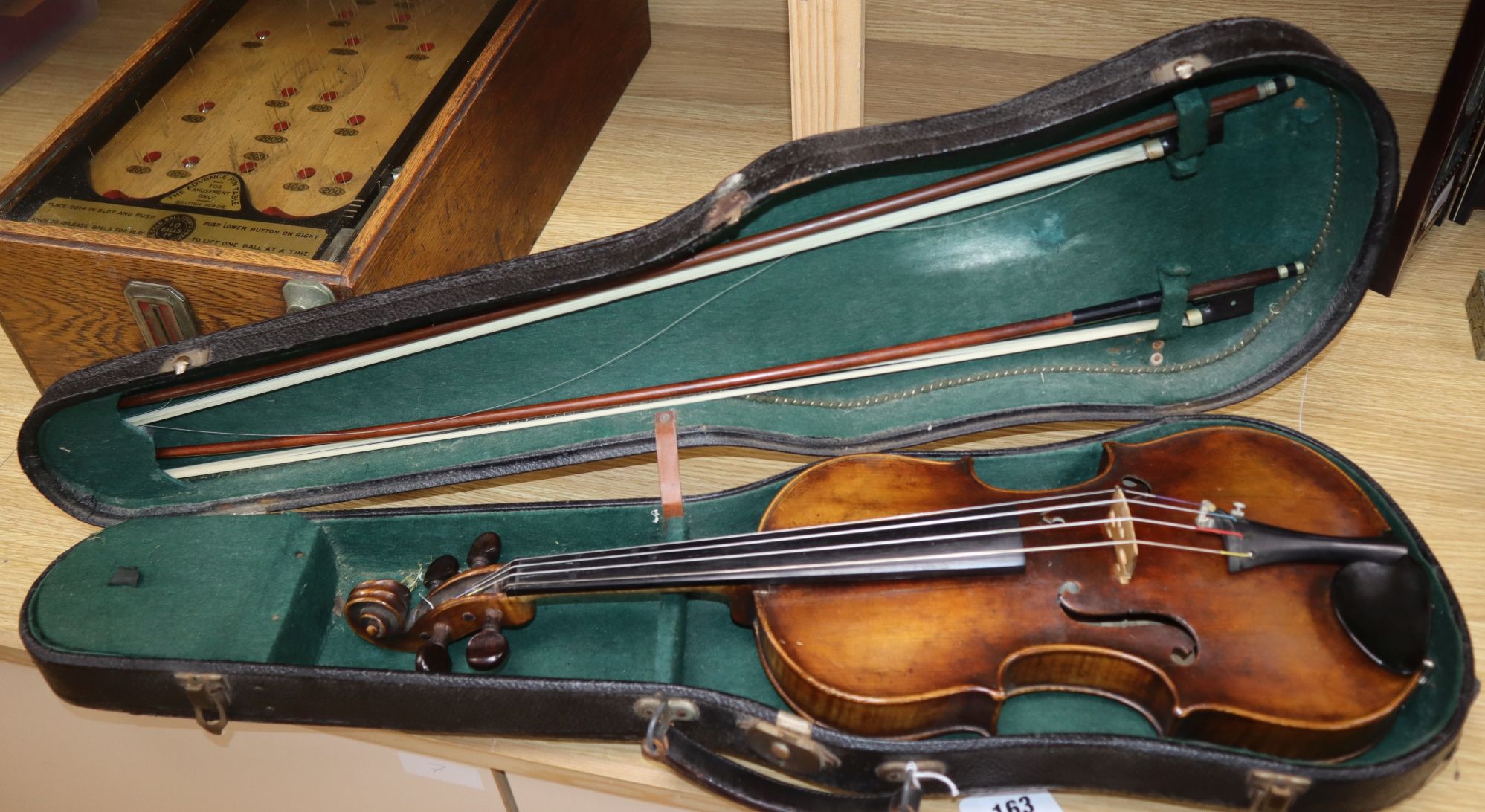 A late 19th / early 20th century Boosey & Co full size violin, cased with 2 bows