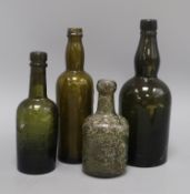 Four 19th century green glass bottles