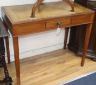 A leather top mahogany writing table W.92cm