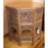 An Indian carved hardwood octagonal occasional table W.58cm