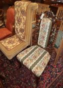 An early Victorian mahogany prie-dieu chair and a carved mahogany side chair (2)
