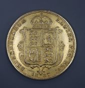 A Victorian 1887 gold half sovereign.