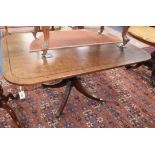 A George III mahogany and ebony strung tilt top breakfast table 143cm