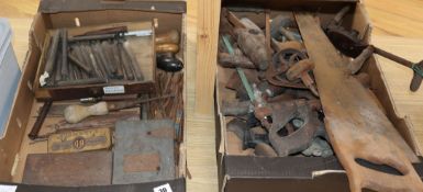 A collection of carpentry and bookbinding tools