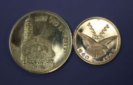 A 916.6 finesse Battle of Britain 25th Anniversary coin and a Moshe Dayan 1967 gold medal.