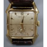 A gentleman's 10k gold filled Hamilton rectangular cased manual wind wrist watch, on later