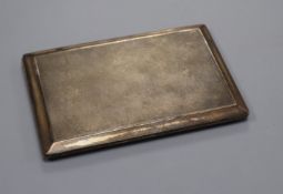 A George V silver engine turned cigarette case, 12.8cm.