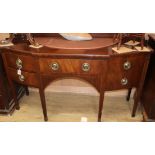 A George IV satinwood banded mahogany breakfront sideboard W.172cm