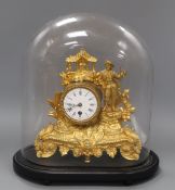 A 19th century gilt mantel clock, under dome