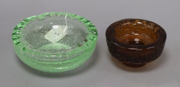 A Daum Nancy frosted amber glass pedestal ashtray and a green glass ashtray, both signed