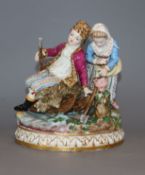 A Meissen porcelain group emblematic of Winter, modelled as a boy seated on a sledge and a girl