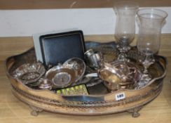 A plated tray, a pair of plated embossed candlesticks and sundry plated wares