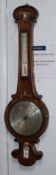 A Victorian rosewood and mother of pearl inlaid wheel barometer H.96cm