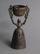 A 1930's silver marriage wager cup with figural base, Birch & Gayden, London, 1936, 13.5cm.