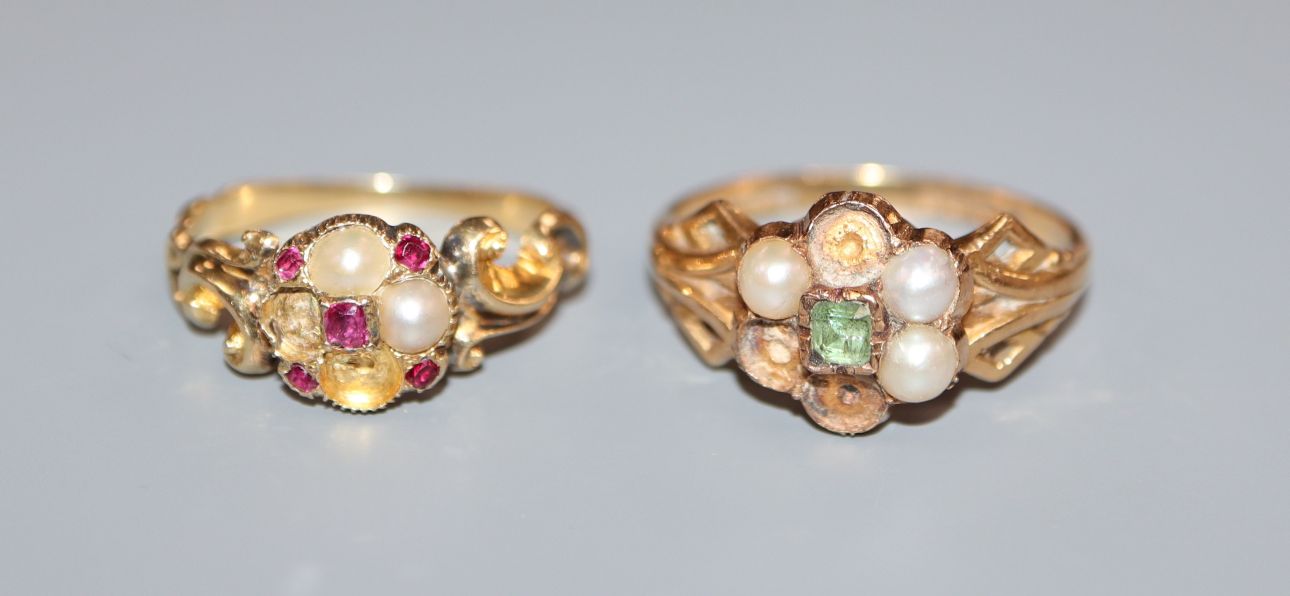 Two Victorian yellow metal and gem set cluster rings including one stamped 18ct gold (stones