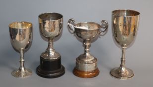 Four assorted silver trophy goblets/cups,, including two Victorian, (a.f.), inscriptions, tallest