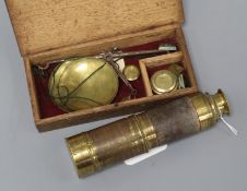 A brass three drawer telescope and set of brass scales