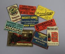A quantity of miniature enamel signs