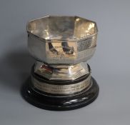 A George V Brittania standard silver octagonal trophy bowl, Chester, 1928, 13.8cm, on ebonised base,