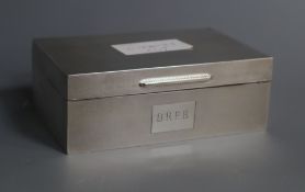 A modern silver engine turned cigarette box, London, 1961, 14cm.