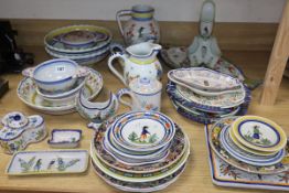 A large collection of Quimper pottery