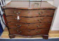 A George III mahogany satinwood cross-banded serpentine fronted chest W.102cm