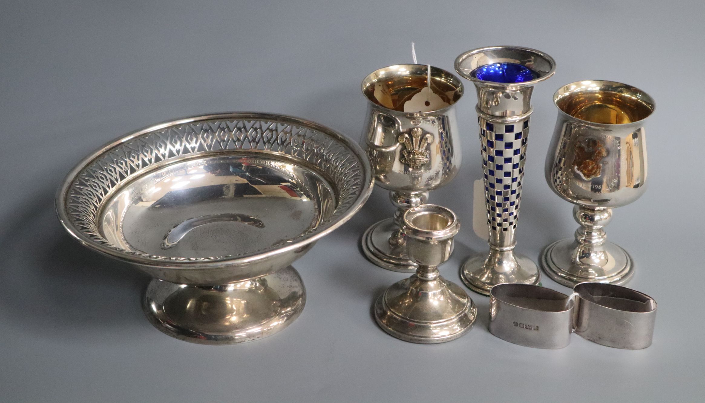 A pair of silver and silver-gilt commemorative goblets, a pierced silver tazza and four other items,