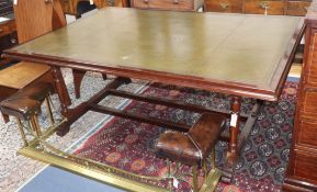 A 19th century mahogany library table with tooled green leather top W.194cm