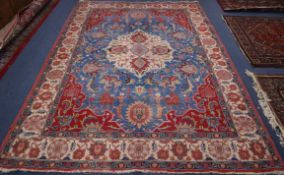 A North West Persian blue ground carpet 320 x 235cm