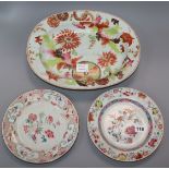 A Chinese famille rose 'tobacco leaf' meat dish and two similar floral plates, Qianlong period and