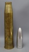 A 1943 English shell casing with a made up shell mount