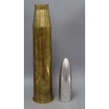 A 1943 English shell casing with a made up shell mount