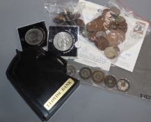 A collection of GB and World coins and banknotes, including some silver proof two pound coins, etc.