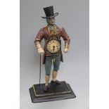 A reproduction pedlar clock height 40cm