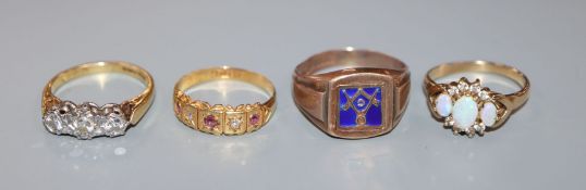 An 18ct gold and illusion set three stone diamond ring, and Edwardian 18ct gold, ruby and diamond