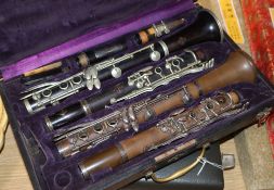 Four cased clarinets - two by Buffet and two by Boosey & Hawker