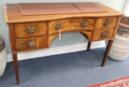 A George III mahogany concave-fronted sideboard fitted four short drawers W132cm