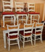 A pale green painted pine topped kitchen table, with six matching French style dining chairs (7)