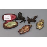 A Chinese green and russet jade fish, a cloisonne enamel snuff bottle, a pewter snuff bottle and two