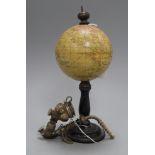 A small table globe on ebonised stand and a pipe globe height 23cm