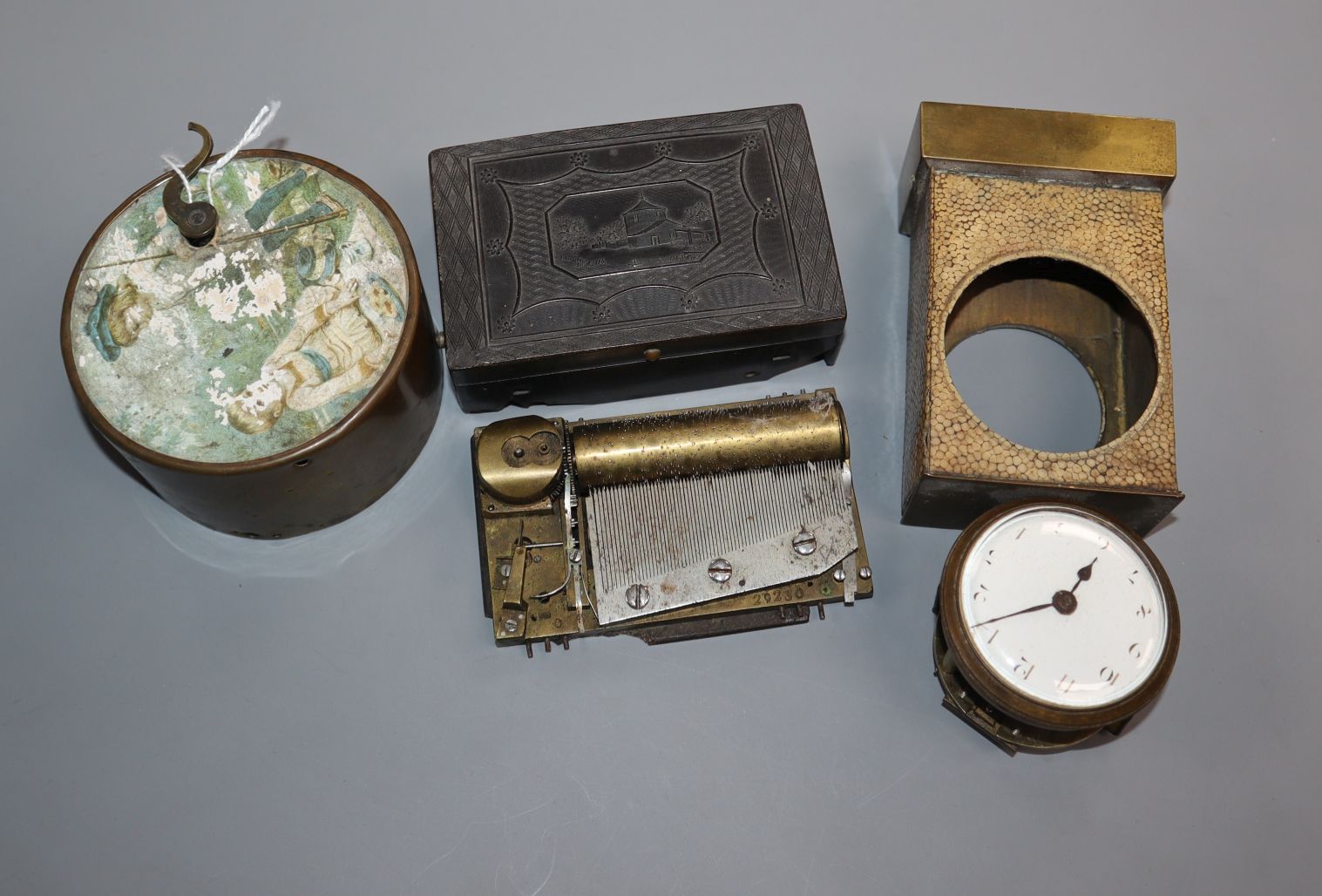 A musical box (a.f.), a circular wind-up musical box and two other items